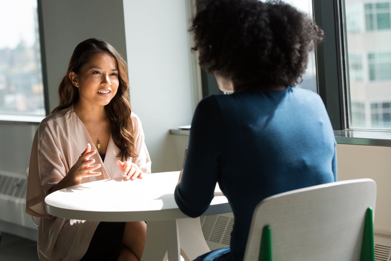 A DPMC consultant leading a client discussion