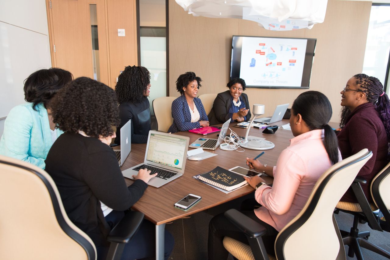 A DPMC consultant presenting to a client
